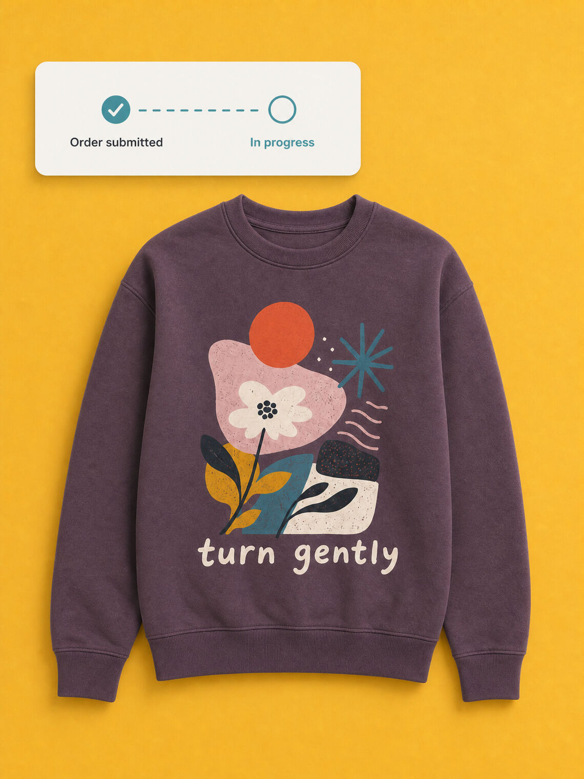 Printed sweatshirt beside a concise submitted-order status